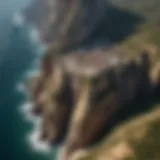 Aerial view of Casterly Rock showcasing its formidable cliffs and oceanic backdrop