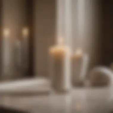 Chic tall white candle in glass enhancing the beauty of a modern spa setting