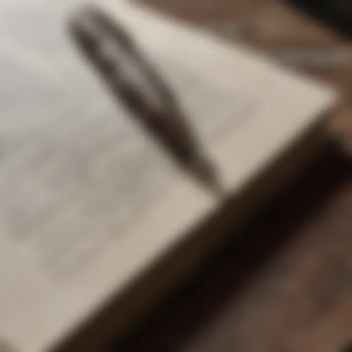 A close-up of a worn-out book with a quill and ink